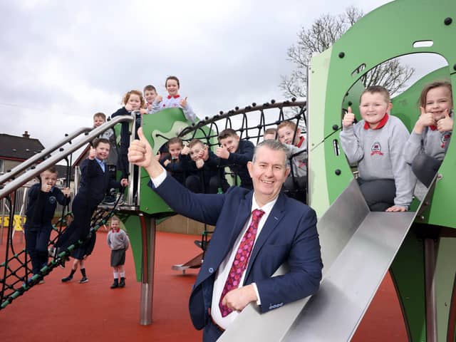 Minister Poots is pictured with children from Newtownstewart Model Primary School and St Patrick’s Primary School, Newtownstewart.