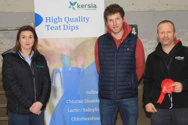 Gareth Taylor, Kircubbin, right, won the honourable mention award at the February Dungannon Dairy Sale. Making the presentation are Emma Kerrigan, Kersia, sponsor; and judge Robert Stewart, Portaferry. Picture: Julie Hazelton