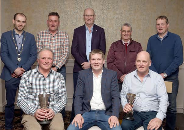 Prizewinners in the Fermanagh Grassland Club's 2021 Vaughan Trust sponsored grazing competition.  Included are (front, from left) Robin Clements, winner of the Stevenson Cup; Trevor Dunn, Vaughan Trust and David Henderson, winner of the Todd Cup (back row) Nigel Graham, Roy Mayers, Derek Saunderson, Robert McCrea and Ian Brown.