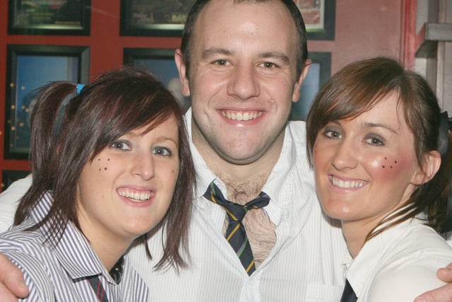 Rachel Mills, Alan Torney and Karen Hamilton pictured at the St. Trinian's disco in the Coach, Banbridge, in 2007. Image: Kevin McAuley