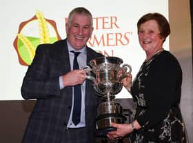 BT cup winner Dr. Christine Kennedy being presented with the trophy by UFU president Victor Chestnutt.