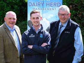 Outgoing chairman Iain McLean, left, and secretary/treasurer John Martin, right, discuss the agenda for Holstein NIâ€TMs 22nd AGM, with sponsor David Patterson, Dairy Herd Management.Photograph: Columba O'Hare/ Newry.ie