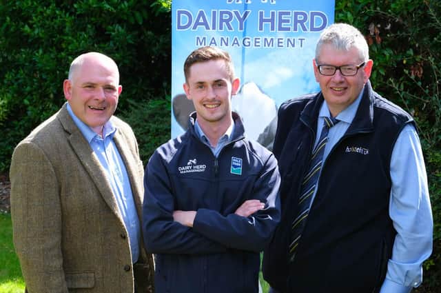Outgoing chairman Iain McLean, left, and secretary/treasurer John Martin, right, discuss the agenda for Holstein NIâ€TMs 22nd AGM, with sponsor David Patterson, Dairy Herd Management.Photograph: Columba O'Hare/ Newry.ie