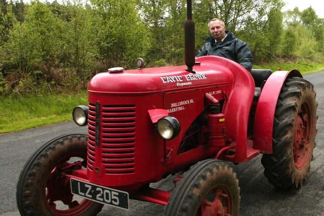 John Willis from Loughgall with his 1947 David Brown Crop Master in the Blossom Vintage Tractor Run from Peatlands Park in 2006. Pic Bernie Brown