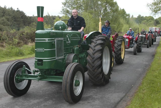Paul Steele from Lurgan in a 1952 Field-Marshall Tractor in the Blossom Vintage Tractor Run from Peatlands Park in 2006. Pic Bernie Brown