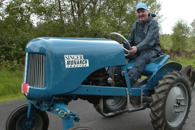 Alex Mackel from Portadown with his Singer Monarch Tractor in the Blossom Vintage Tractor Run from Peatlands Park in 2006. Pic Bernie Brown