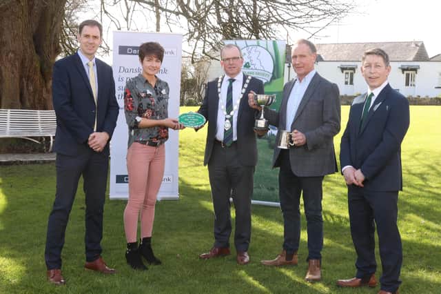 John & Claire Beckett from Donaghcloney receiving the awards for Grassland Farmer of the Year from Harold Johnston, UGS together with Geoffrey Wilson and Rodney Brown from Danske Bank