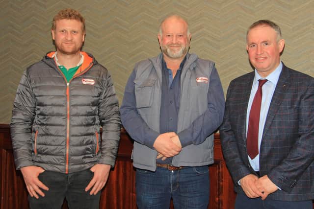 Alan and David Irwin, Redhouse Holsteins, Benburb, pictured at Holstein NIâ€TMs 22nd AGM in Antrim, with Brian Jamieson, Dairy Herd Management. Picture: Julie Hazelton