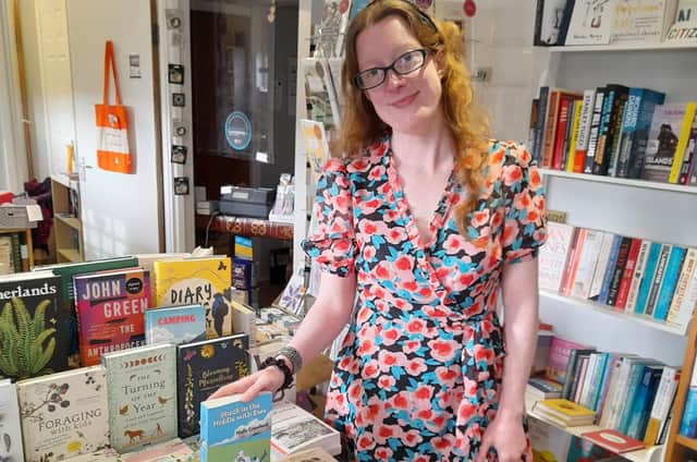 Holly with her book in The Secret Bookshelf, Carrickfergus