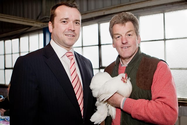 Andy Mills, Ulster Bank regional director of business banking, presents the award for the champion bird at Balmoral Show 2010 to Richard Osborne, from Dromore. Picture: Cliff Donaldson