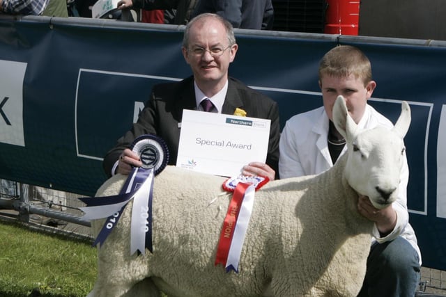 The North Country Cheviot championship at Balmoral Show 2010 was awarded to Desmond Robinson Jnr from Glenarm. He is congratulated by Brendan McGarry agribusiness manager, Northern Bank, Magherafelt. Picture:  Kevin McAuley Photography Multimedia.