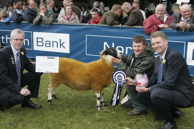 It was a great Balmoral Show 2010 for Ian Crawford from Parkmore as their Blackface ewe clinched the Northern Bank Long Wool Sheep Breeds Championship.  A delighted Ian is pictured accepting crystal and congratulations from Ben Christensen, Deputy Chief Executive Officer, Northern Bank, and John Henning, Head Of Agriculture, Northern Bank.