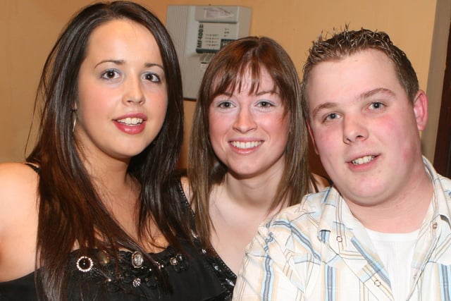 Martin Ford, Emma McIlveen and Patrica Crockard at the New Year's Eve Lisnamurrican and Kells disco held at the Fort Royal, Ballymena, in 2008. Pic Kevin McAuley