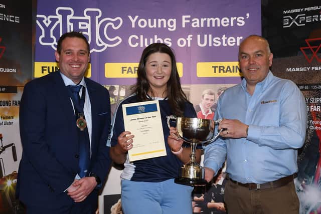 Peter Alexander, president YFCU, Lucy Rodgers, Spa YFC, Junior Member of the Year, and Clarence Calderwood, United Feeds