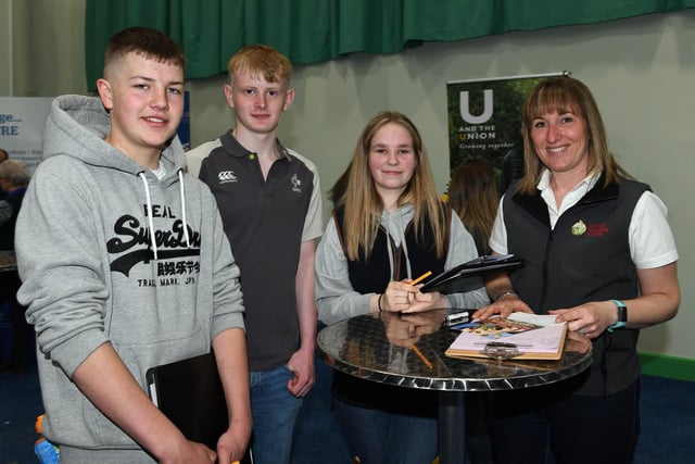 Kathryn McCullough UFU Membership Development Officer explains the benefits of membership to Robyn Marshall, Robbie Morrow and Jack McCready.