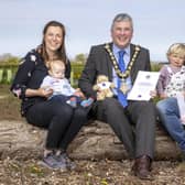 The Mayor of Causeway Coast and Glens Borough Council Councillor Richard Holmes pictured with Hannah and Kyle McAuley, and their children Albert and Harper. Albert, who was born on February 6th 2022, 70 years after HM The Queen’s accession, was presented with a special Jubilee teddy bear and certificate to mark this special date.