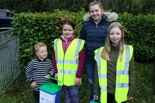 These helpers collected the tractor fee - David Moorhead, Lydia Bingham, Jenny Parke and Anna McCready  - at the Annahinchago tractor run last Friday night