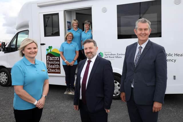 DAERA Minister Edwin Poots and Health Minister Robin Swann announce the delivery of new Farm Family Health Check Programme vehicle at Balmoral Show.  Also pictured are Farm Family Health Check staff - Front Christina Faulkner and back L-R  Helen McCauley, Moyra McMaster and Eileen Irwin.
