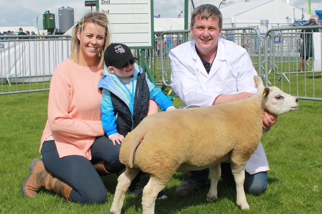 Celebration time is a family affair. Mark, Sinead and Archie Latimer celebrate their success in the ram lamb class