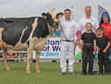 Holstein champion and reserve interbreed dairy champion was Peak Chief Fran VG88 owned by the Millar family, Coleraine, and exhibited by Andrew Kennedy. Included are Martin and Bella Millar, Hannah and Brodie Steel, with Laura McConnell, Fane Valley. Picture: Julie Hazelton