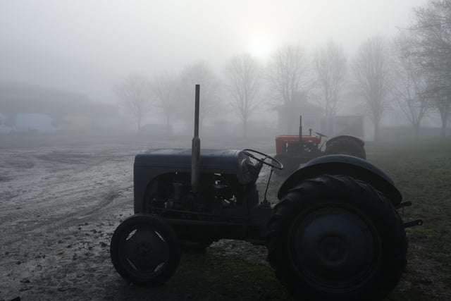Two tractors in the fog outside the Somerset Vintage Farm Show. Image: Raw Cut Television