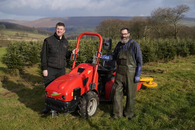 Contributors Stuart Kirkup and Gary John Hewings standing either side of Sirio 4x4 Compact tractor. Image: Raw Cut Television