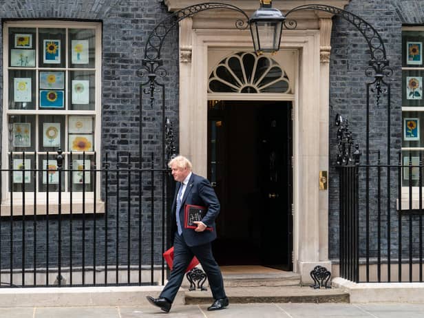 Prime Minister Boris Johnson departs 10 Downing Street, London, the day after the publication of the Sue Gray report into parties in Whitehall during the coronavirus lockdown. Picture date: Thursday May 26, 2022.