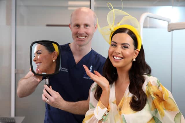 Dr Aidan Callanan, Principal Orthodontist at Zen Orthodontics braces himself as he prepares to scrub up for his new role as official sponsor of Down Royal Racecourseâ€TMs Ladies Day. Joining him to launch the hotly anticipated event is Ladies Day host, Rebecca McKinney who is never fully dressed without her Zen Orthodontics smile!