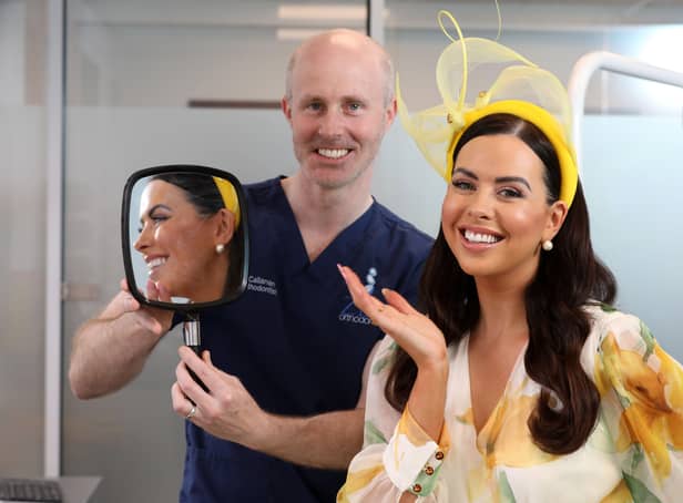 Dr Aidan Callanan, Principal Orthodontist at Zen Orthodontics braces himself as he prepares to scrub up for his new role as official sponsor of Down Royal Racecourseâ€TMs Ladies Day. Joining him to launch the hotly anticipated event is Ladies Day host, Rebecca McKinney who is never fully dressed without her Zen Orthodontics smile!