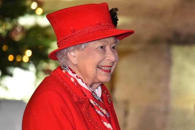 WINDSOR, ENGLAND - DECEMBER 08: Queen Elizabeth II thanks local volunteers and key workers for the work they are doing during the coronavirus pandemic and over Christmas in the quadrangle of Windsor Castle on December 8, 2020 in Windsor, England.  The Queen and members of the royal family gave thanks to local volunteers and key workers for their work in helping others during the coronavirus pandemic and over Christmas at Windsor Castle in what was also the final stop for the Duke and Duchess of Cambridge on their tour of England, Wales and Scotland. (Photo by Glyn Kirk - WPA Pool/Getty Images)