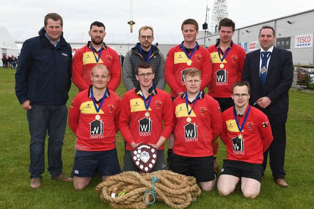 Derg Valley YFC won the advanced title at the YFCU tug of war competition. Left to right, Philip Donaldson, John Thompson and Sons Ltd Representative, Derg Valley YFC and Peter Alexander, YFCU president