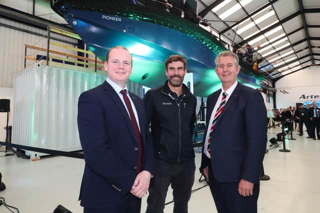 DAERA Minister Edwin Poots, MLA pictured with Economy Minister Gordon Lyons, MLA and CEO of Artemis Technologies, Dr Iain Percy OBE at the Artemis eFoiler Belfast Showcase.