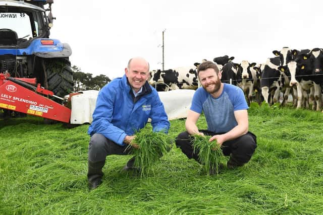 CAFRE Adviser Michael Verner with Geoffrey Malcomson highlighting the importance that home grown grass is the best resource farmers have at their disposal to reduce costs which will be discussed during the event on the family’s farm in Newry.