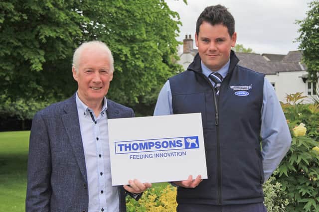 Outling plans for the National Simmental Show on 11th June are Leslie Weatherup, treasurer, NI Simmental Club; and  sponsor Nathan Harvey, Thompsons. Picture: Julie Hazelton