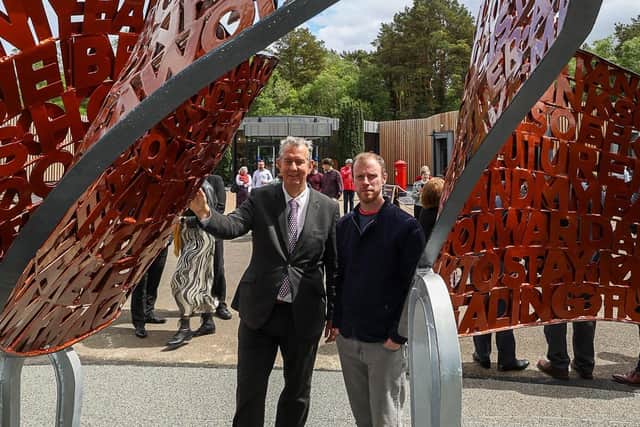 DAERA Minister Edwin Poots (L) chats with artist Kevin Killen, about his new sculpture for the launch of the newly enhanced section of the Ulster-Ireland International Appalachian Trail (IAT) during a visit to the Ulster American Folk Park in Omagh.


Photo by Philip Magowan / Press Eye