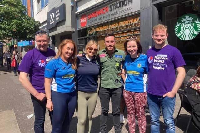 Nathan Carter was on hand to give the members of Holestone YFC who took part in the charity abseil at the Europa Hotel some support
