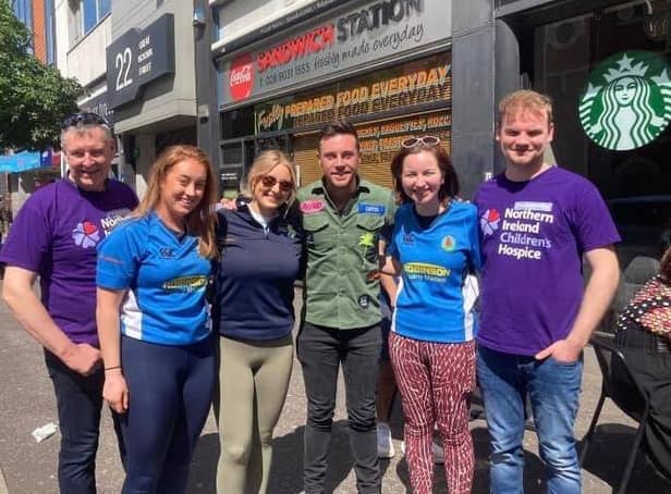 Nathan Carter was on hand to give the members of Holestone YFC who took part in the charity abseil at the Europa Hotel some support