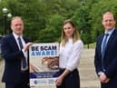 Economy Minister Gordon Lyons pictured with Damien Doherty, Chief Trading Standards Officer for Northern Ireland and Trading Standards Area Inspector Linda Houston at the launch of the National Scams Awareness Campaign which runs from 13 to 26 June 2022.