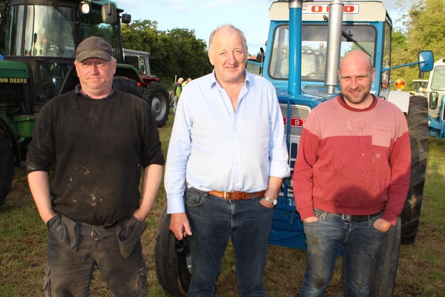 Last Thursday night Aughnaskeagh Community Association held their annual tractor run with 60 tractors taking part. Pictured, from left, Roger Graham, Errol Kelly and Thomas Corbett who supported the event