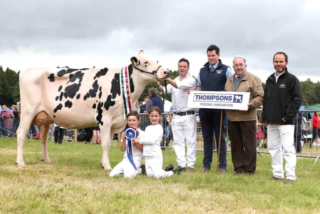 Thompsons Dairy Cow qualifier Jason Booth at Armagh show pictured with Andrew Kennedy Brian King NISA and Nathan Harvey from Thompsons.