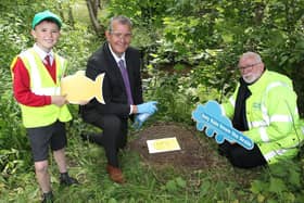 Environment Minister Edwin Poots pictured with Ballyclare Primary School pupil Jack Pollock and Jim Gregg from the Six Mile Water Trust at the launch of the Northern Ireland Environment Agency ‘Yellow Fish’ campaign; a simple water pollution prevention tool that aims to raise awareness of water pollution and positively engage local communities and businesses.