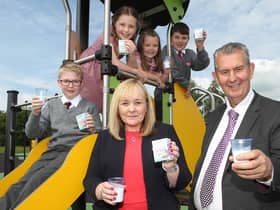 Environment Minister Edwin Poots and Education Minister Michelle McIlveen pictured with pupils from Eden Primary School in Carrickfergus, one of 442 Primary Schools in Northern Ireland to participate in the School Milk Subsidy Scheme.