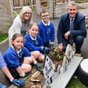 Minister Poots is pictured with (left to right) Jenny Fletcher P5 and Eco Council teacher; Naomi Kelly; Victoria Bakanova; Ben Kirk and Principal of Knockbreda PS, Pamela McKenna.