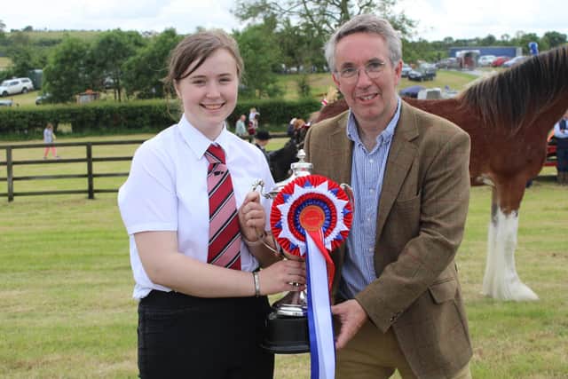 Samara Radcliffe receiving her Champion of Champions prize at Saintfield Show on Saturday.