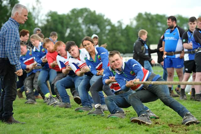 Big effort from the Lisnamurrican Young Farmers lads and lasses at the tug o war competition.