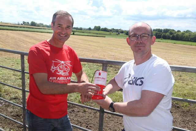 David McAfee and Paul Quinn. The pair are members of Ballycastle Runners AC. Paul and three other club mates will take on four half marathons in four days in August to raise money for Air Ambulance NI. Image: Kevin McAuley/McAuley Multimedia.