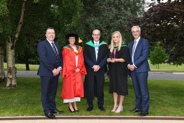 Charlotte Waide (Cloughmills) was presented with the Department of Agriculture, Environment and Rural Affairs Prize for achieving the highest marks in all subjects in the final year of the Foundation Degree in Food Manufacture and Nutrition at the Loughry Campus Graduation Ceremony. Congratulating Charlotte are Guest Speaker: George Mullan (Managing Director, ABP Foods), Professor Aine McKillop (Associate Dean, Ulster University), Martin McKendry (Director, CAFRE) and Norman Fulton (Deputy Secretary, DAERA).