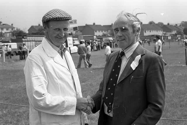 Mr David Moses, who judged the Herefords at the Ballymena Show in June 1982, congratulating Mr Eric Haire of Dundrod, who, with his brother, Ivan, won the supreme breed championship with a bull. Picture: Farming Life/News Letter archives