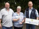 Alan and Sylvia Irwin, Rehouse, Benburb, receive the award for the best 70 cow in the junior section from Paul Thompson, Cookstown Dairy Services. Picture: McAuley Multimedia