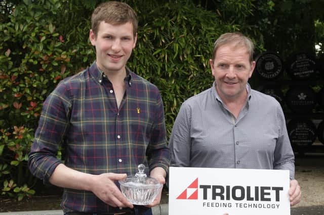 Robert Stewart, Quinton, Portferry, won the award for the best cow family in the senior section of Holstein NIâ€TMs herds inspection competition.  He was congratulated by judge Paul Flanagan. The senior section was sponsored by Triolie.t. Picture: McAuley Multimedia
